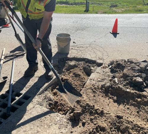 Public Works crew performing pothole repair.