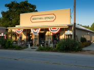 Was Berkley Grocery and Weisinger Washateria. Rebuilt in 1920 after the fire.