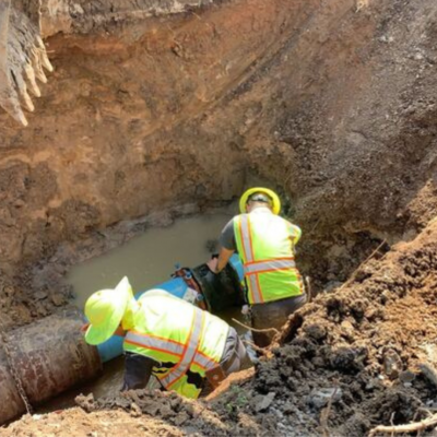 Public Works crew performing main line repair.