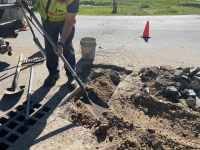 Public Works crew performing pothole repair.